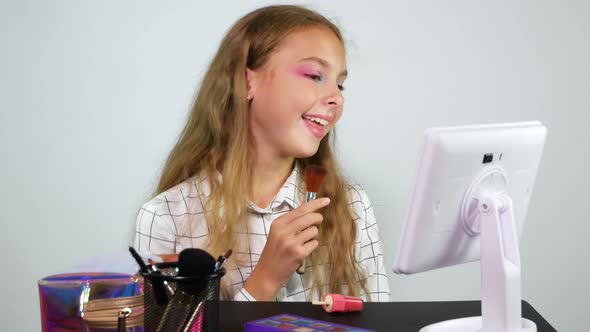 Teen Model With Bright Eye Make Up Holds Brush And Sings