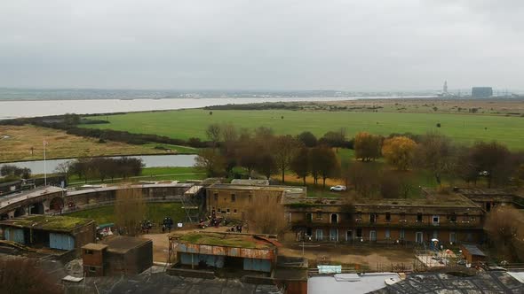Flying above Coalhouse Fort revealing the River Thames and Tilbury docks in background