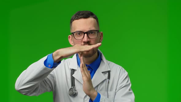 A Doctor Show a Timeout Gesture