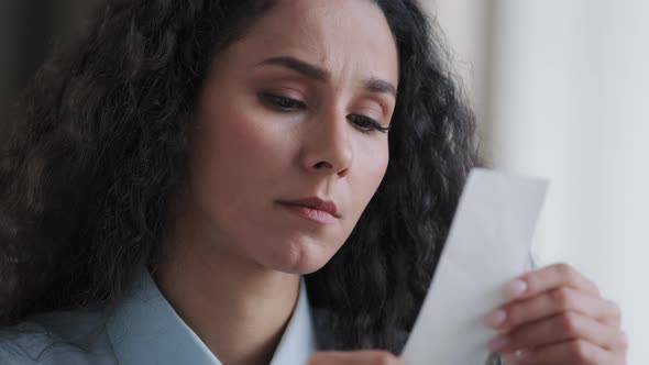 Worried Young Woman Employee Feel Stressed About High Tax Looking at Unpaid Bank Debt Check Costs