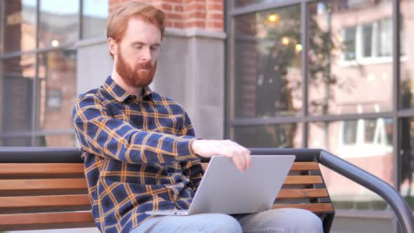 Redhead Beard Young Man Leaving Bench After Closing Laptop