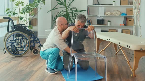 Professional Physiotherapist Working with a Patient a Brain Stroke