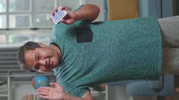 Asian Man Blogger Shoots Video Content For Social Networks, Magician With Playing Cards