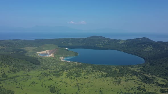 Flying Above Caldera of the Golovnin Volcano with Two Lakes on Kunashir Island. Russia.