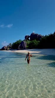 Anse Source d'Argent La Digue Seychelles Young Woman on a Tropical Beach During a Luxury Vacation in