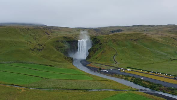 Skogafoss Waterfall on Skoga River on South Iceland in Summer  Aerial Drone Footage