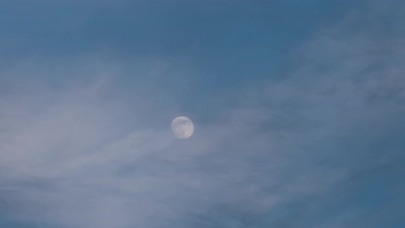 Full moon evening sky clouds time lapse.