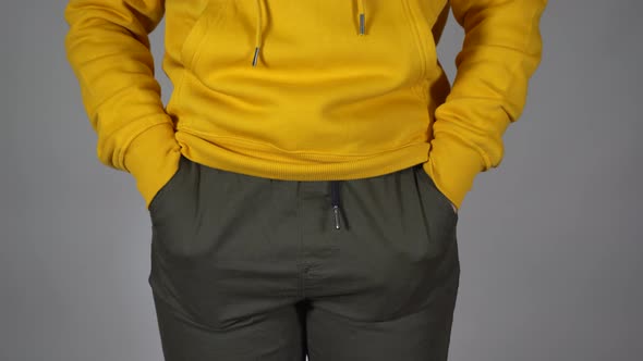 Close Up of Unrecognizable Woman Put Her Hands in Her Pockets of Pants