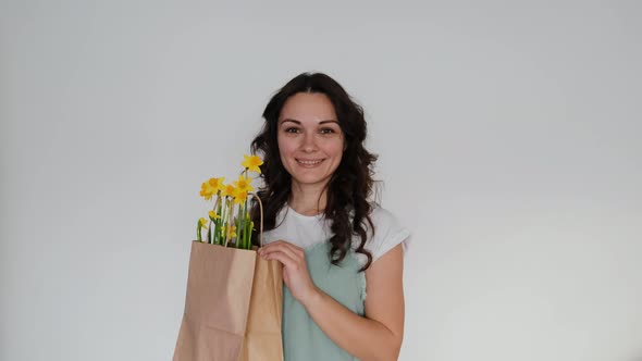 Female Florist with Flower Paper Bag on White Background