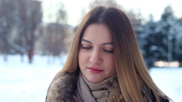 Portrait of Fashionable Sexy Beautiful Girl in Winter in Park