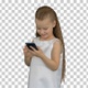 Little girl using smartphone, Alpha Channel - VideoHive Item for Sale