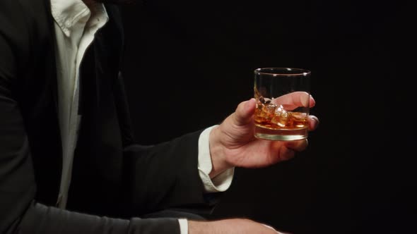 Drinking Brandy or Whiskey Closeup