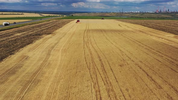 Aerial View of Combine on Harvest Field