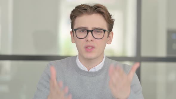 Portrait of Angry Young Man Fighting Arguing