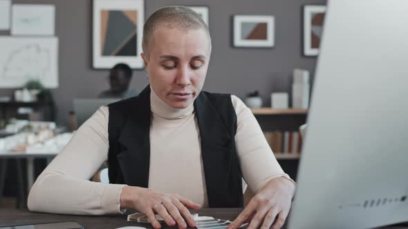 Short-haired Woman Using Computer