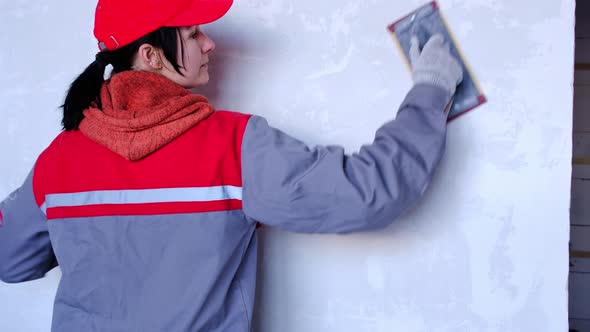 Sanding of walls with sandpaper after treatment with dry building mixes with plaster and putty befor