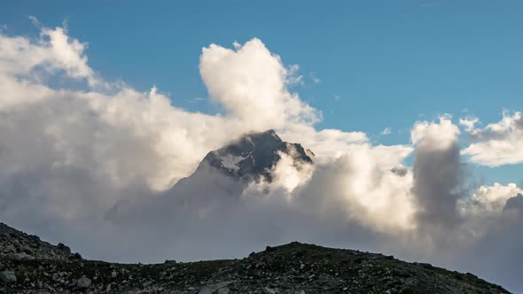 Mountain surrounded by clouds