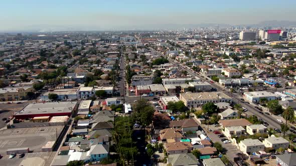 4K Drone Tilt Up South Los Angeles Cityscape