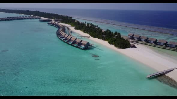 Aerial above travel of relaxing lagoon beach adventure by blue sea and white sandy background of jou