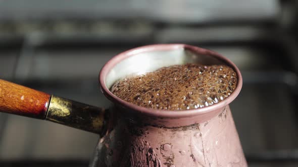 Natural Aromatic Coffee Boils in the Turk and Froths