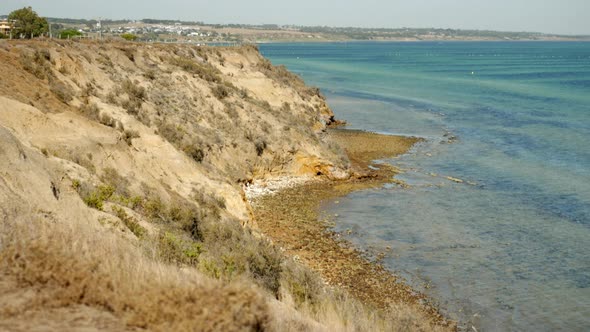Blue waters and coastal scene of Clifton Springs Australia. PAN UP SHOT.
