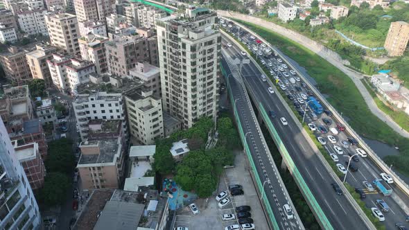 Aerial footage of Morning rush hour of traffic to enter the town in shenzhen city, China. Hypelapse