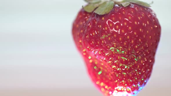 Close Up of Juicy Strawberries on a Gray Background