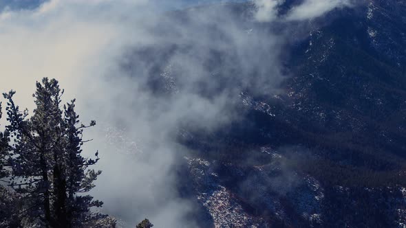 Cold winter clouds swirl above the Sandia mountains near Abuquerque.