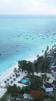 Vertical Video Boats in the Ocean Near the Coast of Zanzibar Tanzania