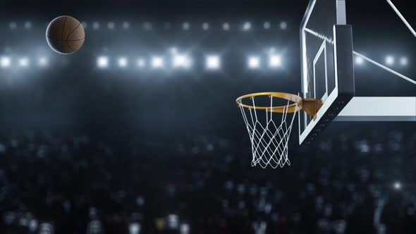 Basketball Hit the Basket in Slow Motion on the Background of Flashes of Cameras