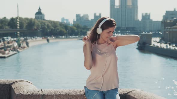 Dancing girl with headphones