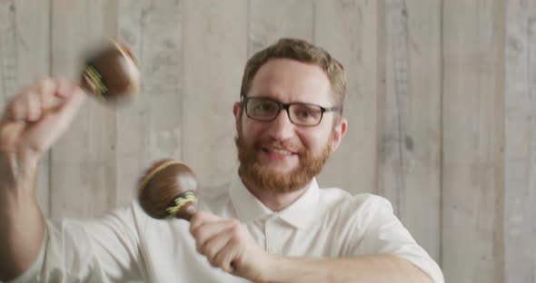 Office Worker with Glasses Dancing with Maracas