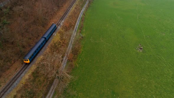 Commuter Train in the Early Morning Mist