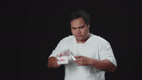 Asian Man Shows Trick With Playing Cards, Cardistry