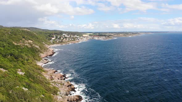 Swedish shore with small town of Molle in distance seen from Kullaberg, aerial