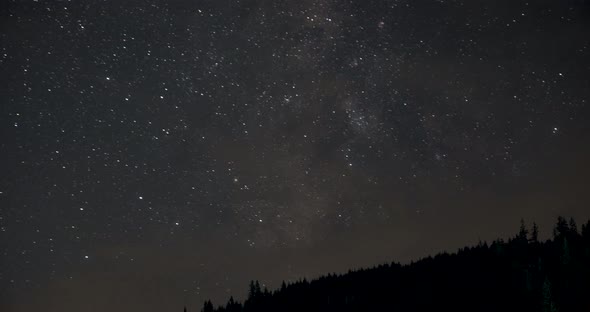 Bright Stars At The Night Sky Over The Mountains