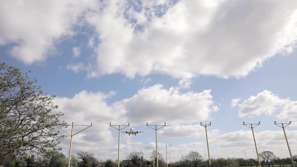 Airplane flying low during approach at London Heathrow airport