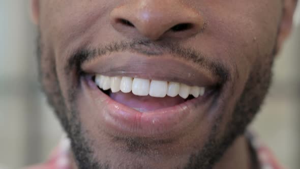 Close Up of Smiling Lips of African Man