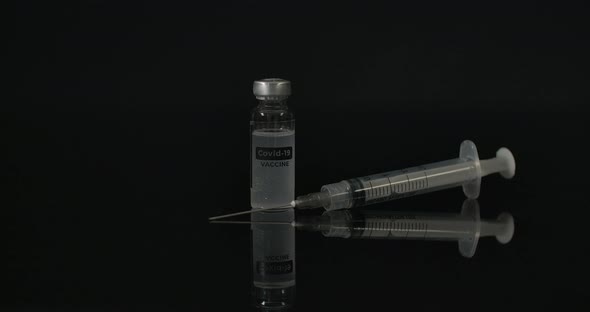 Syringe And Covid Vaccine