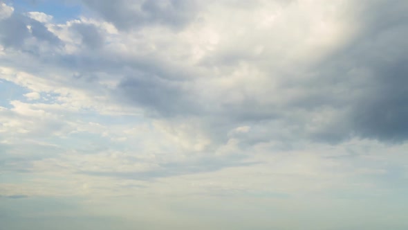 Heavy Clouds Leave and Come Before Sunset alt