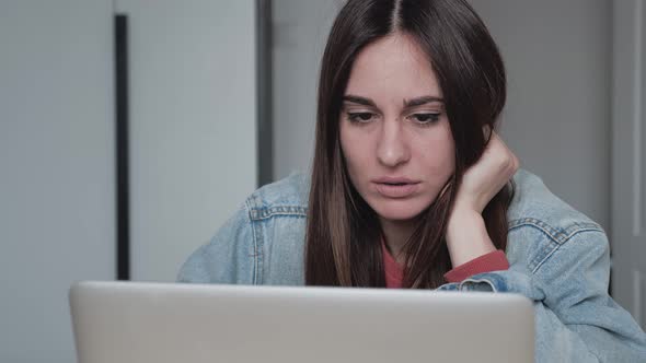 Closeup Upset Millennial Female Student Reading Bad News Laptop Home Office