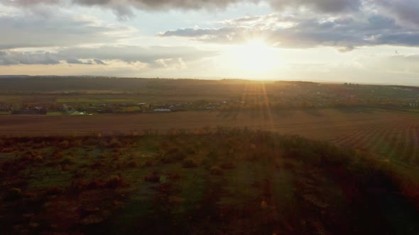 Flying Over an Green Empty Field