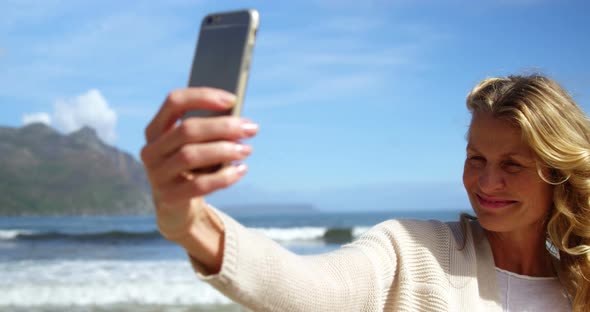 Mature woman taking a selfie from mobile phone