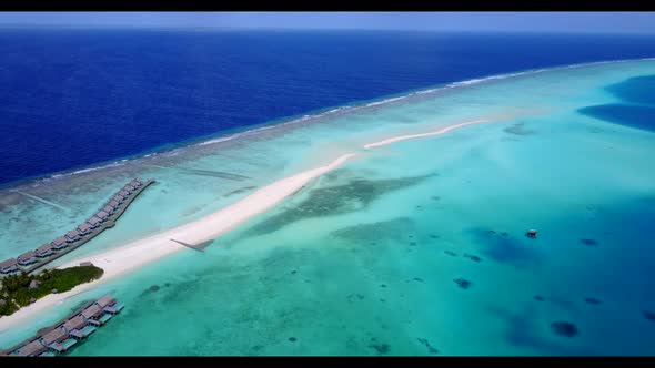 Aerial top down seascape of luxury coastline beach time by blue lagoon with white sand background of