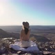 Young Woman Sitting Topless on Blanket at Edge of Fish River Canyon in Namibia - VideoHive Item for Sale