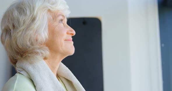 Thoughtful senior women in yoga center 4k