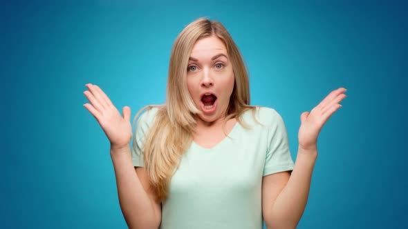 Portrait of Woman Shocked and Surprised with Good News