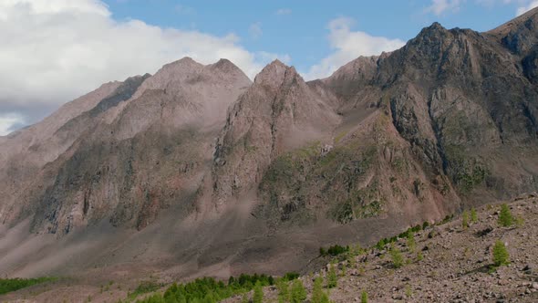 High mountains of Aktru valley with river and forest