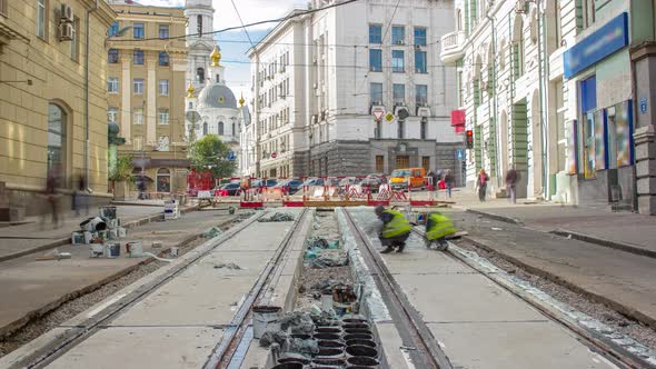 Workers Do Cleaning of the Railway Tram Line After Construction Works