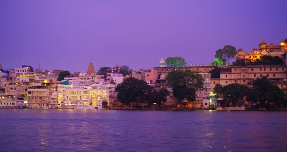 Udaipur Lal Ghat, Houses and City Palace on Bank of Lake Pichola with Water Riffles - Rajput